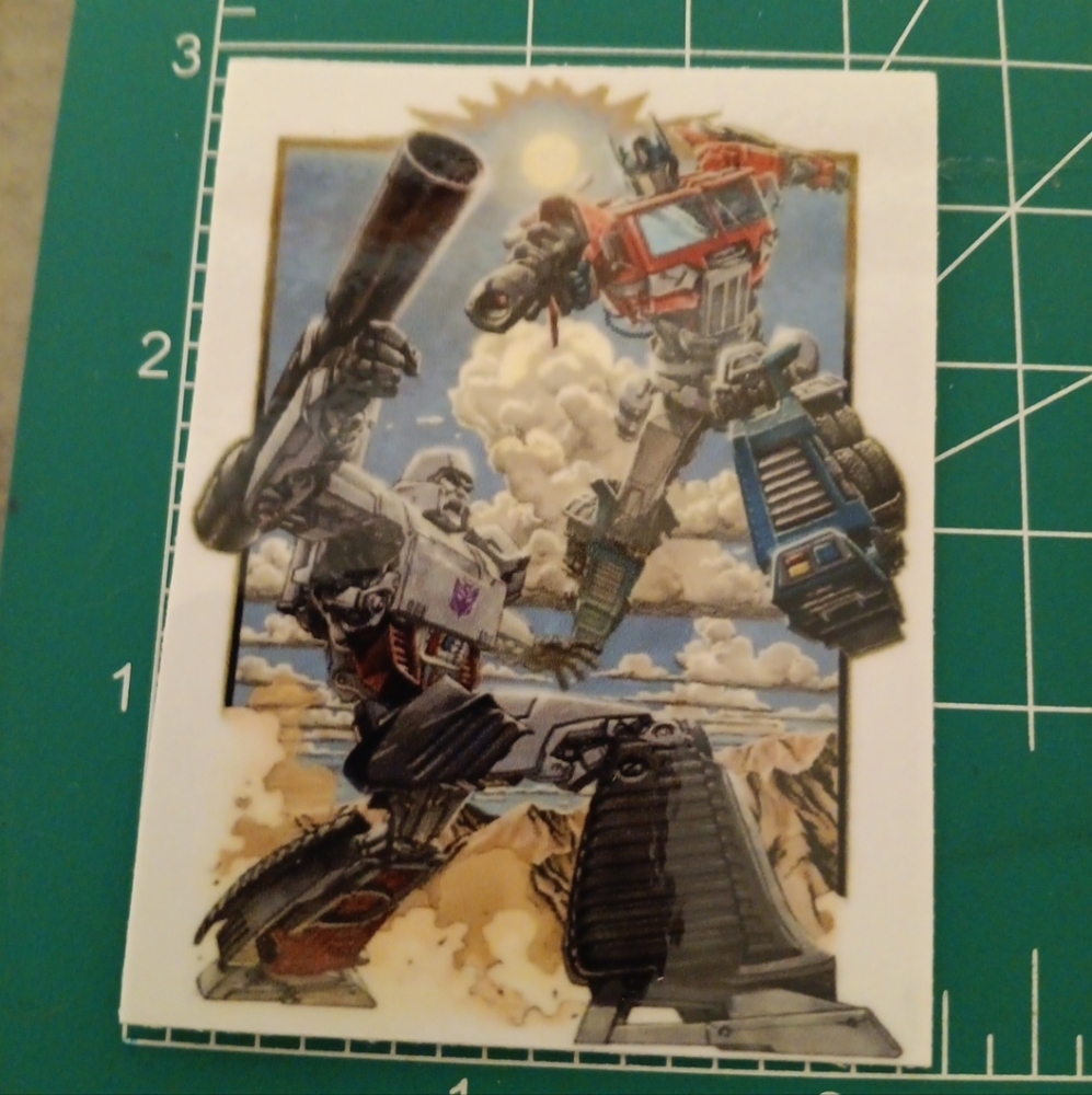 TRANSFORMERS STICKER OPTIMUS PRIME VS MEGATRON